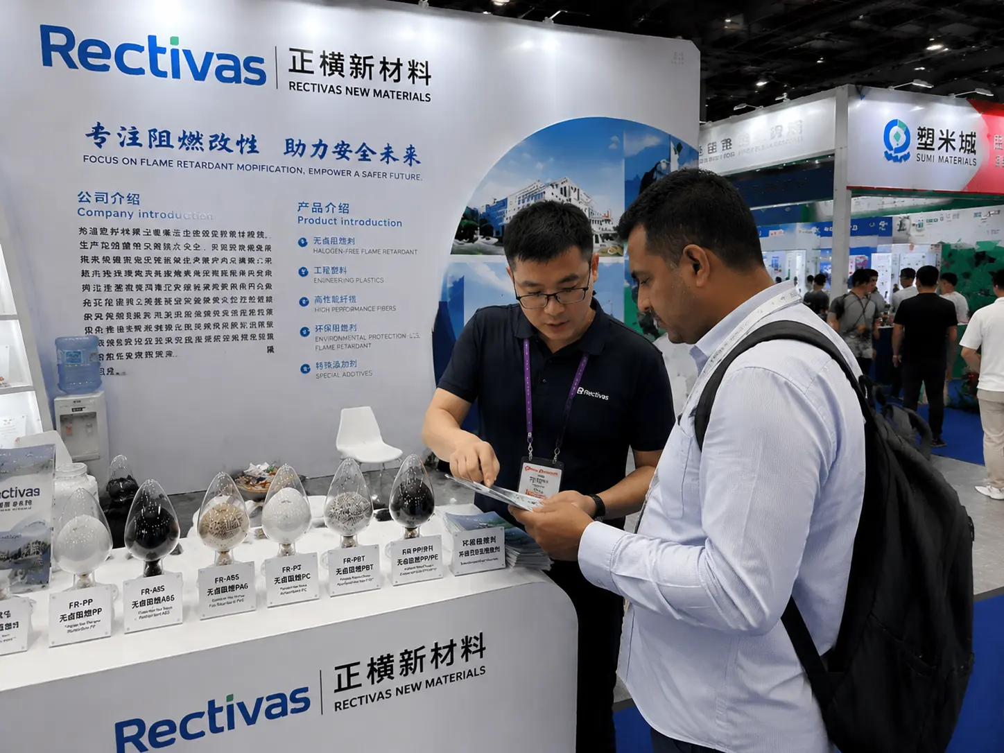 Rectivas staff talking with a visiting buyer at a trade show booth