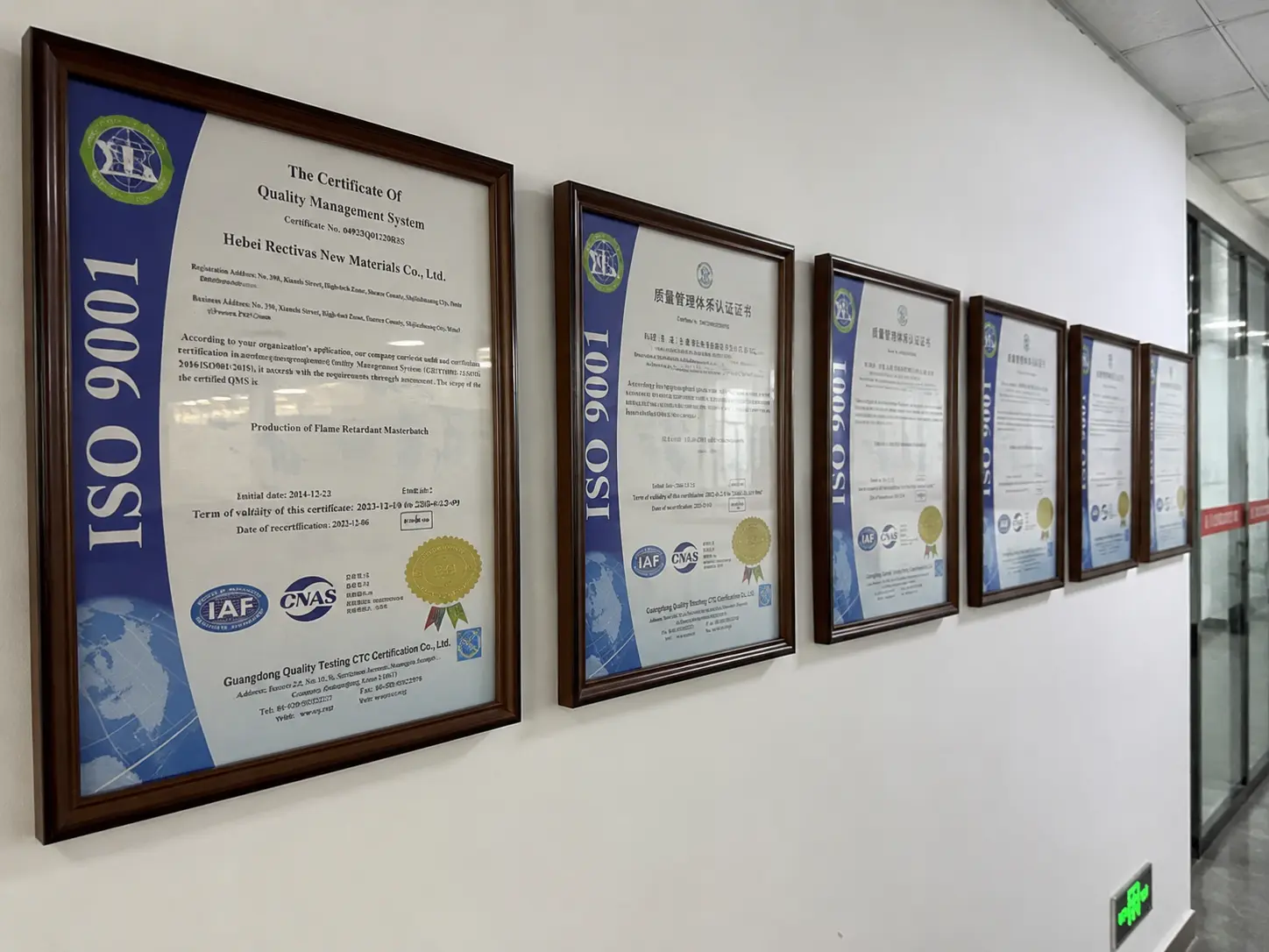 ISO 9001 certificates on the office wall